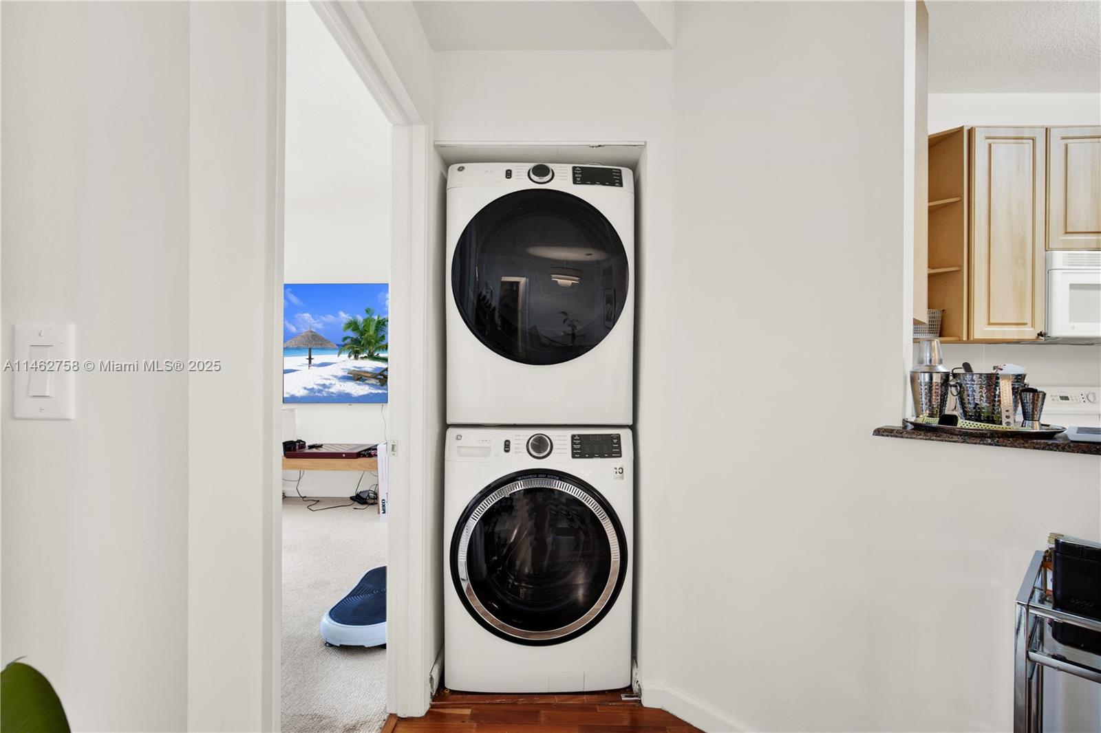 1 Century Lane, Unit 209 Miami Beach, FL 33139 - Photo 25 of 66 a utility room with dryer and washer