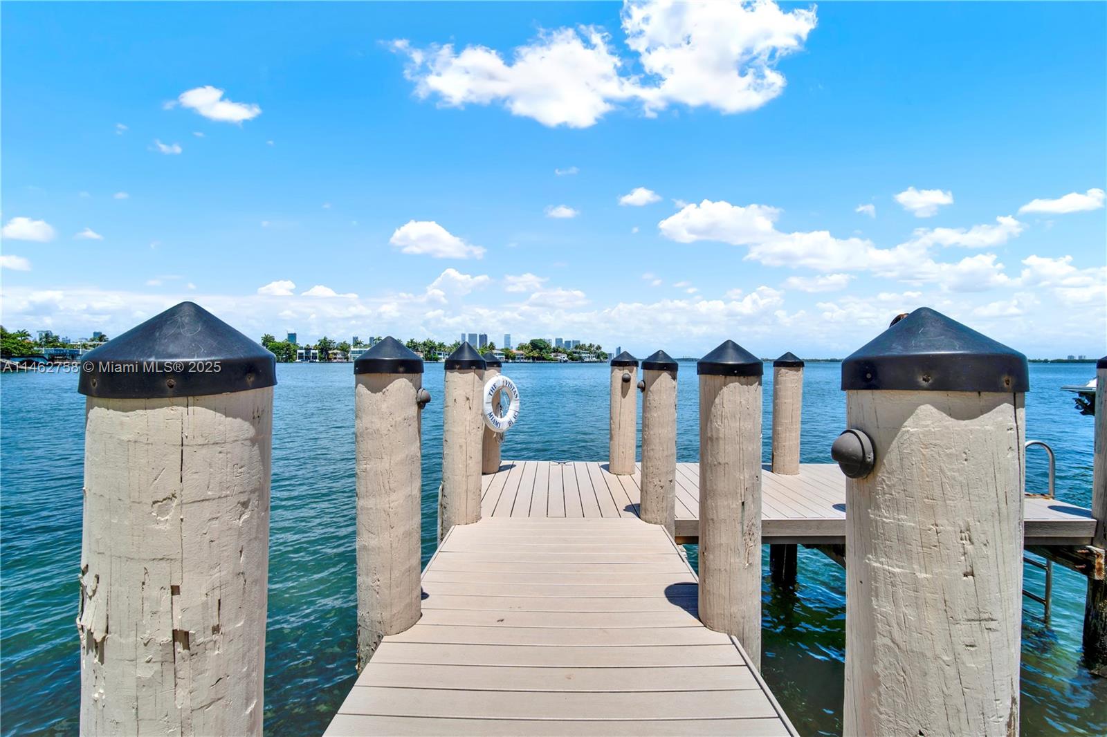 1 Century Lane, Unit 209 Miami Beach, FL 33139 - Photo 46 of 66 a front view of a house with a yard and garage