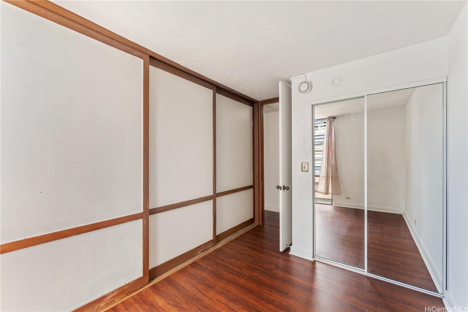 1505 Alexander Street, Unit 1205 Honolulu, HI 96822 - Photo 18 of 25 a view of entryway with wooden floor