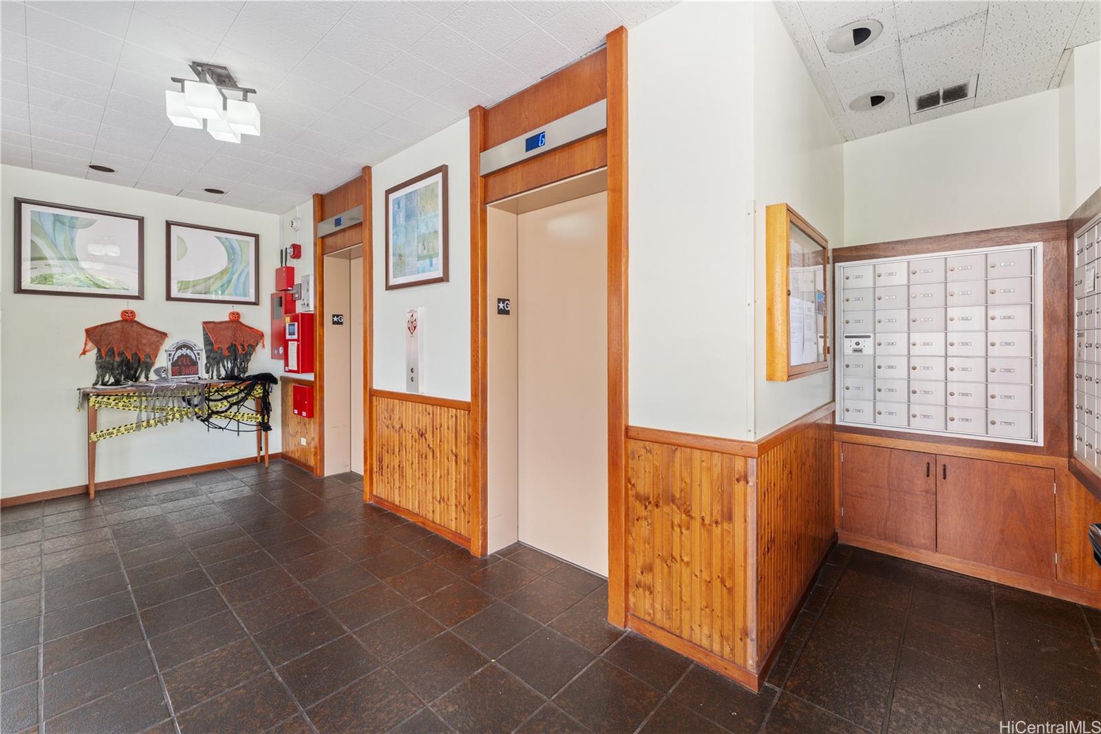 1505 Alexander Street, Unit 1205 Honolulu, HI 96822 - Photo 19 of 25 a view of an entryway with wooden floor