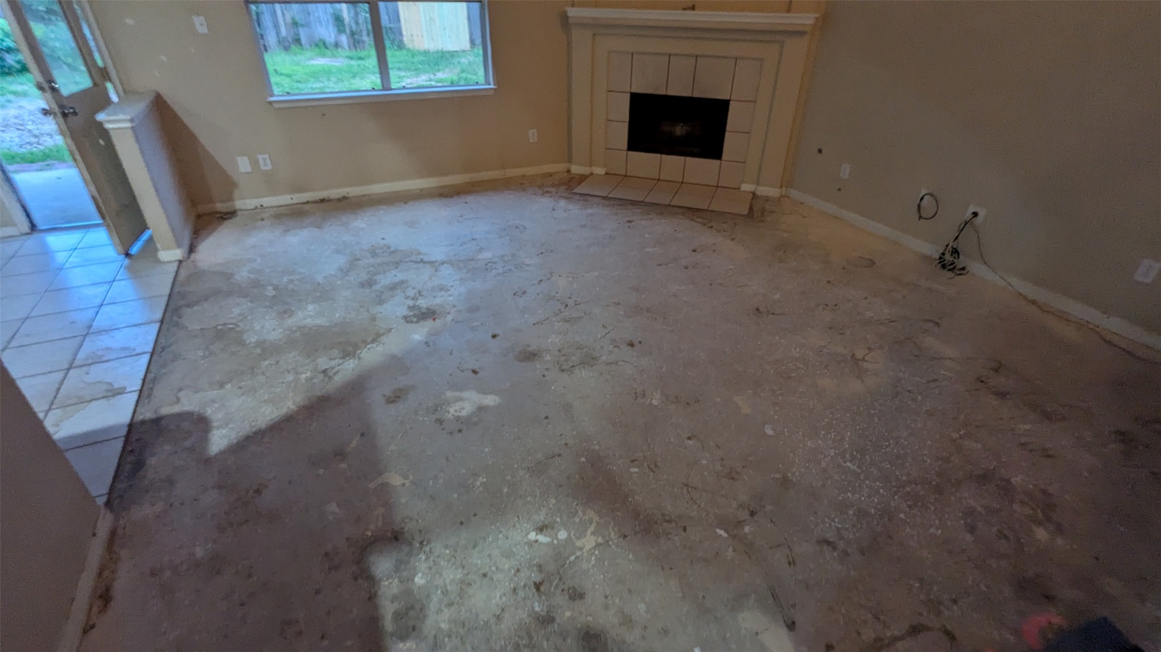 21850 Catoosa Drive Spring, TX 77388 - Photo 5 of 15 a view of an empty room with a fireplace