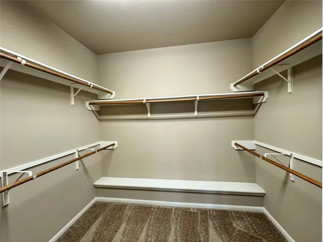 a view of a room with racks on the wall