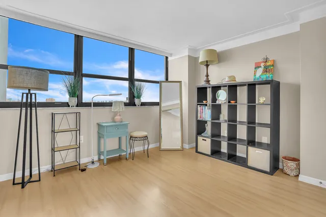a view of livingroom with furniture and window