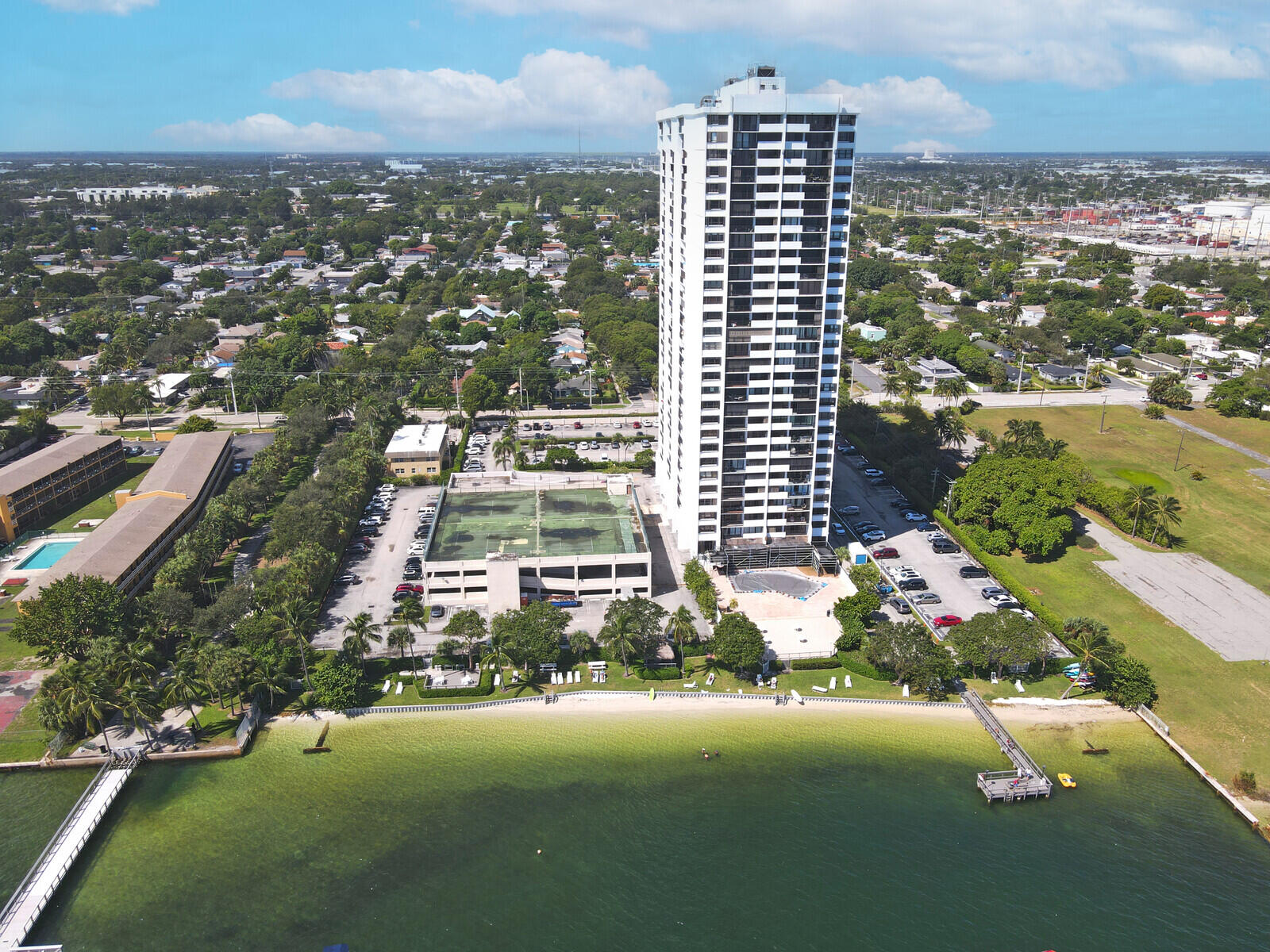 5600 North Flagler Drive, Unit 907 West Palm Beach, FL 33407 - Photo 33 of 48 an aerial view of residential building and lake