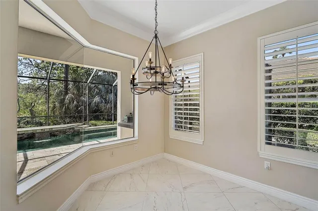 a view of a room with windows