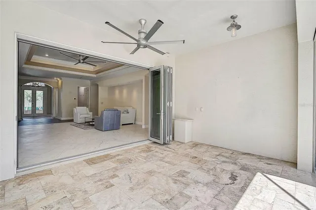 a view of a backyard with a patio and wooden floor