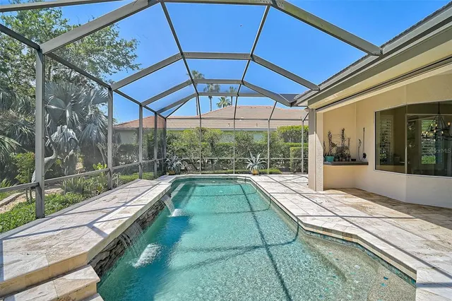 an aerial view of a house with a garden