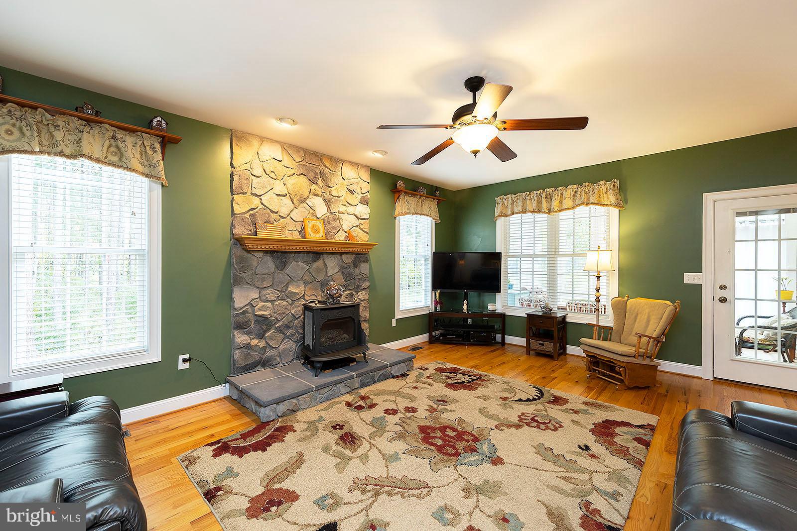 210 Wakeman Mill Road Front Royal, VA 22630 - Photo 22 of 105 Family room that leads out to a 3 season sun room