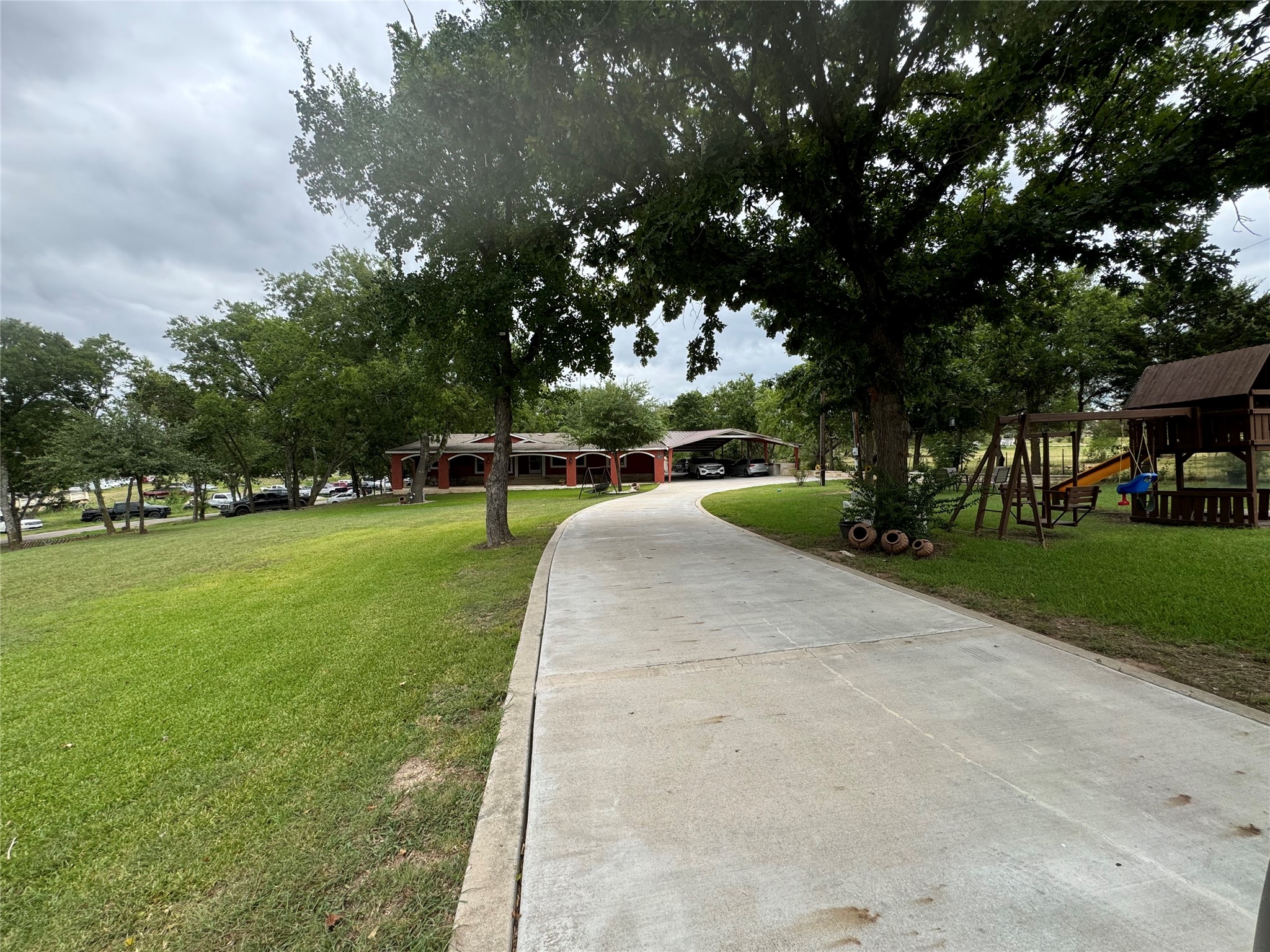 13623 Avis Road Dale, TX 78616 - Photo 2 of 24 concrete drive way