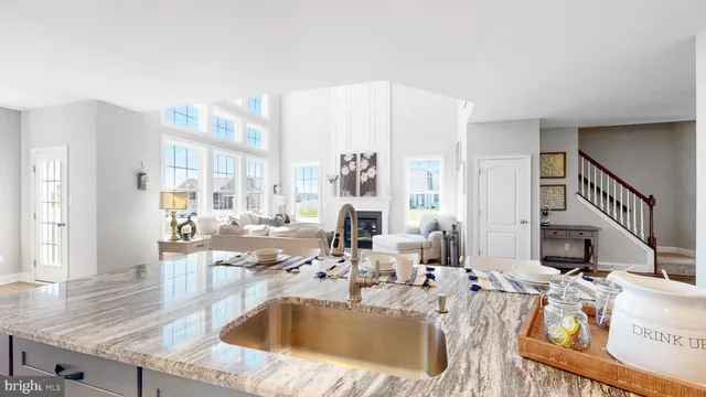 a bathroom with a sink vanity and a mirror