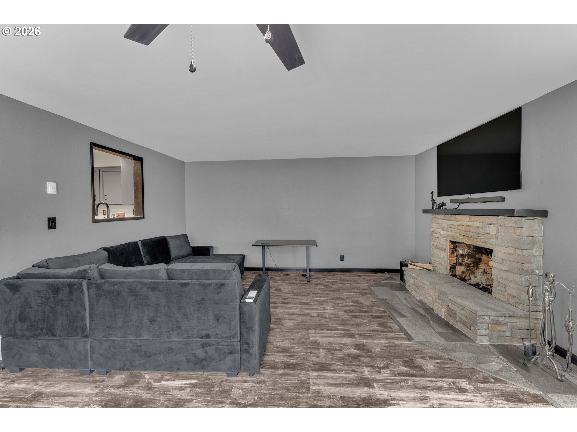 1735 Rainbow Drive Springfield, OR 97477 - Photo 11 of 17 a living room with furniture and a flat screen tv