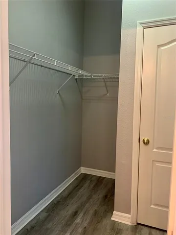a view of an empty walk in closet