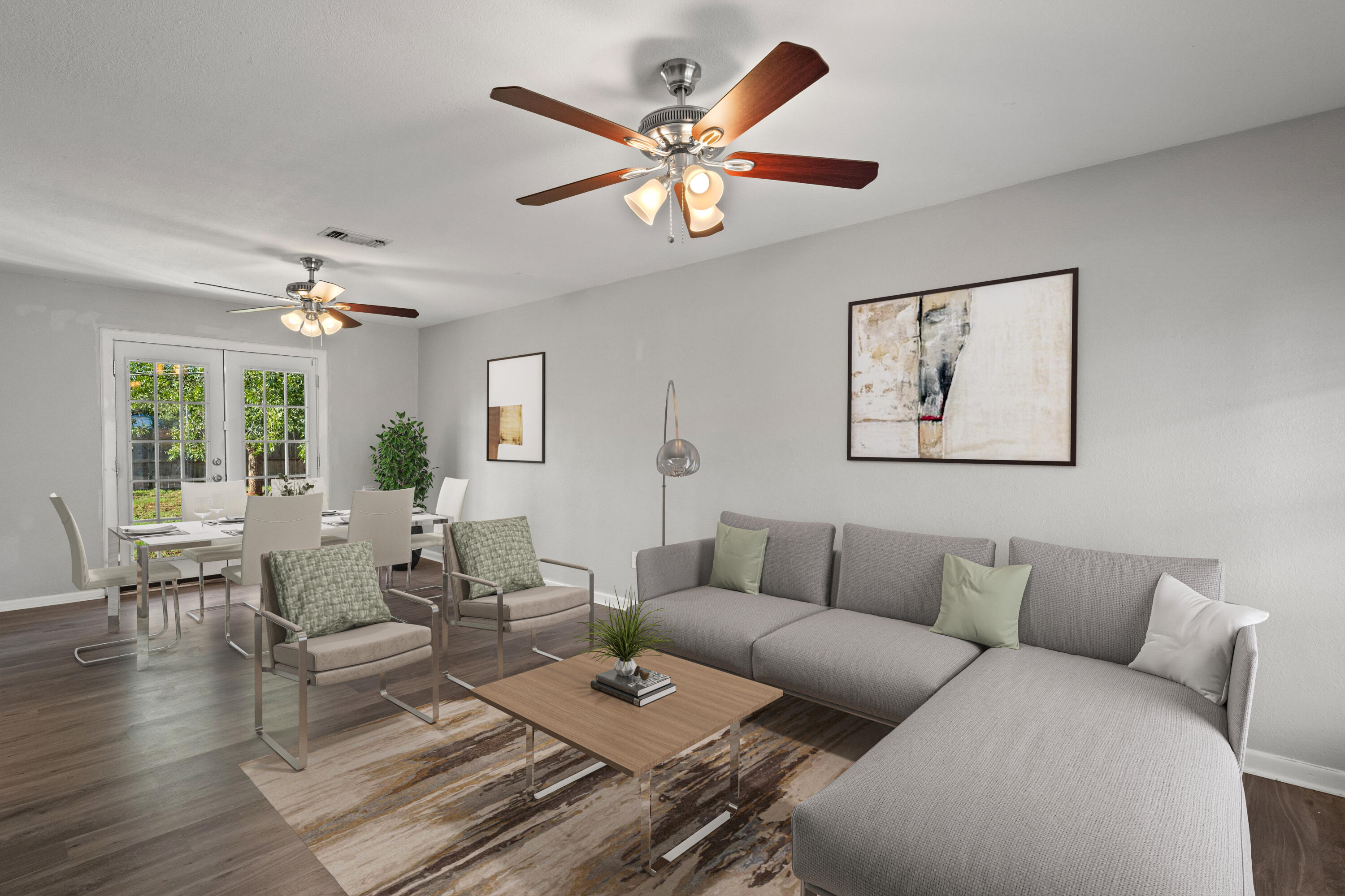 5105 38th Street Lubbock, TX 79414 - Photo 2 of 13 a living room with furniture a chandelier fan and a window