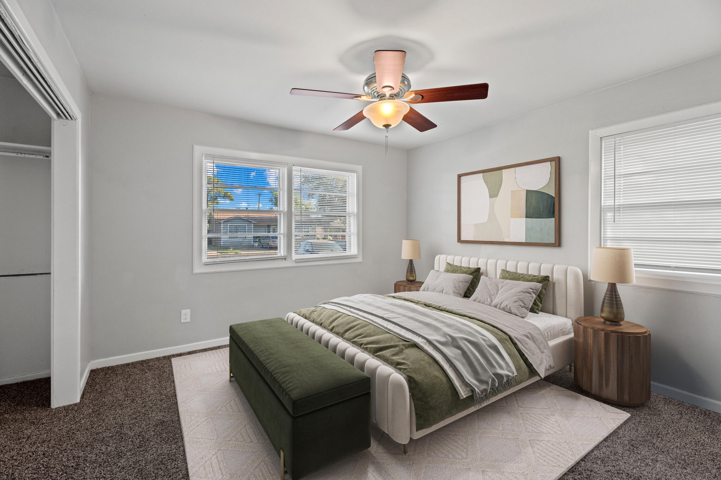 5105 38th Street Lubbock, TX 79414 - Photo 5 of 13 a bedroom with a bed and a chandelier