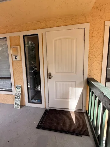 a view of a door and a door