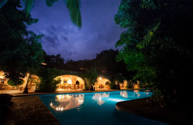 a view of a living room and bathroom
