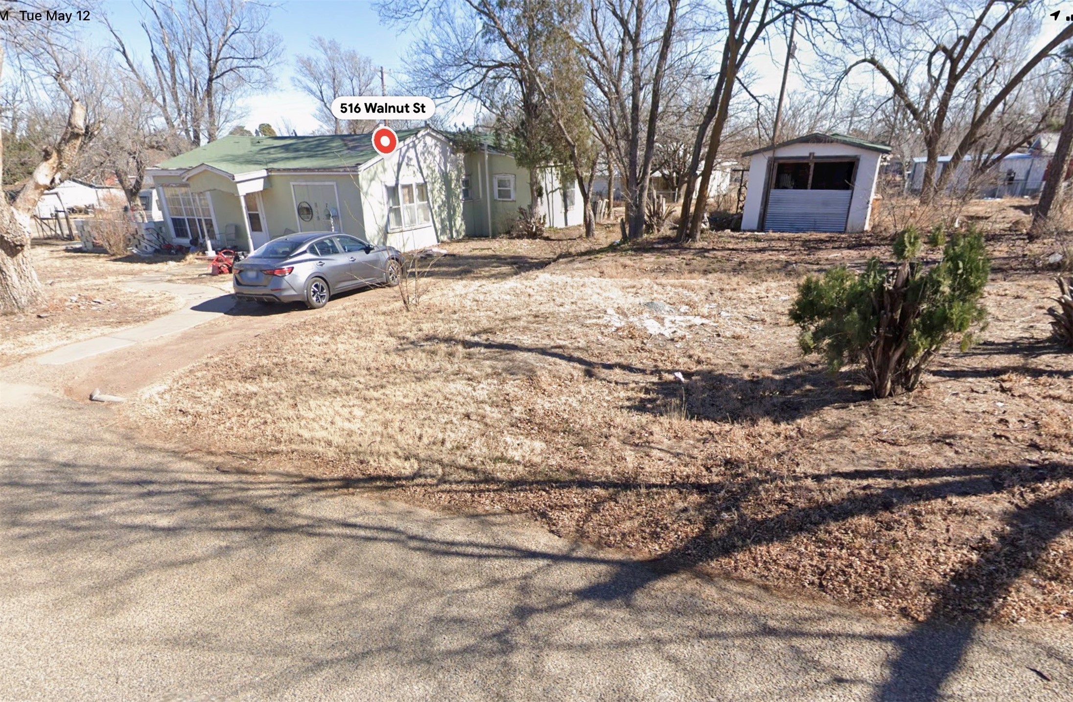 516 Walnut Street McLean, TX 79057 - Photo 10 of 12 a view of road and with car parked