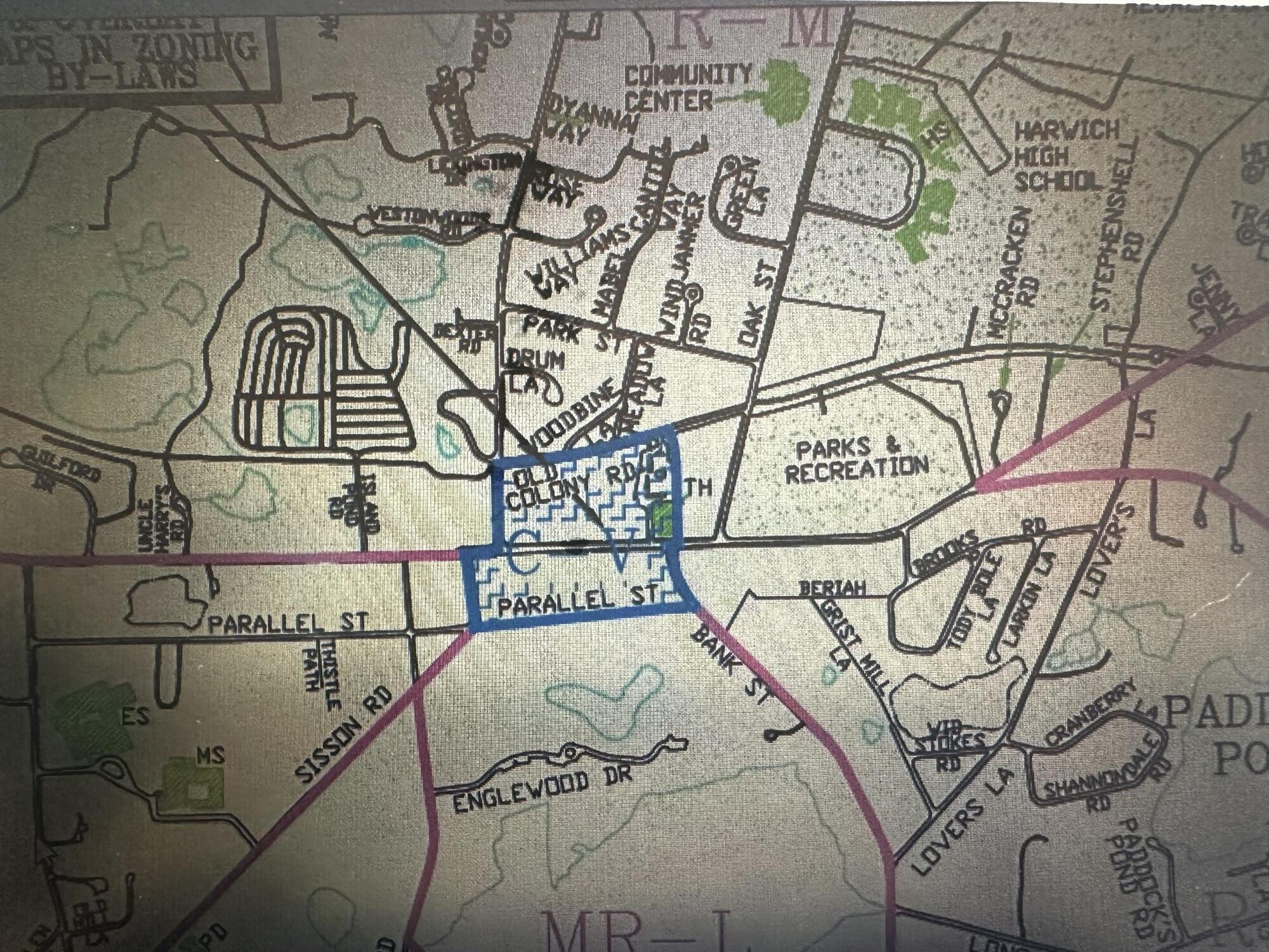 33 Old Colony Road Harwich, MA 02645 - Photo 13 of 16 walk in a bedroom next to a wall with a wooden floor