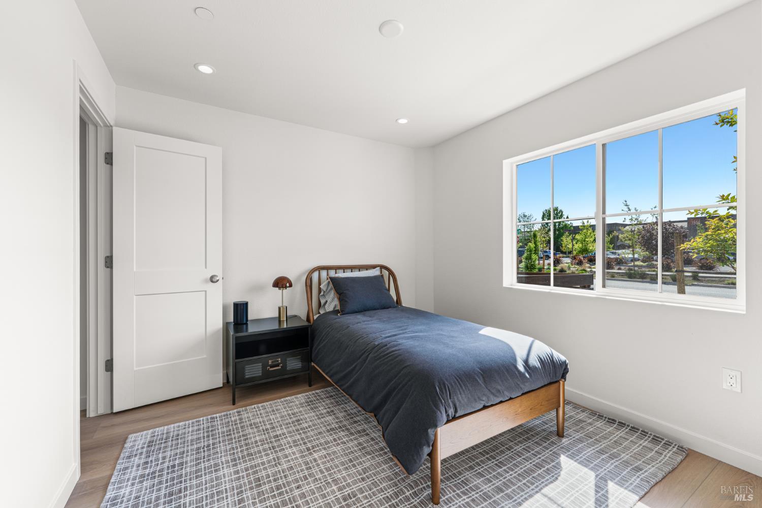 1460 Waterside Lane Rohnert Park, CA 94928 - Photo 19 of 21 a bedroom with a bed and window