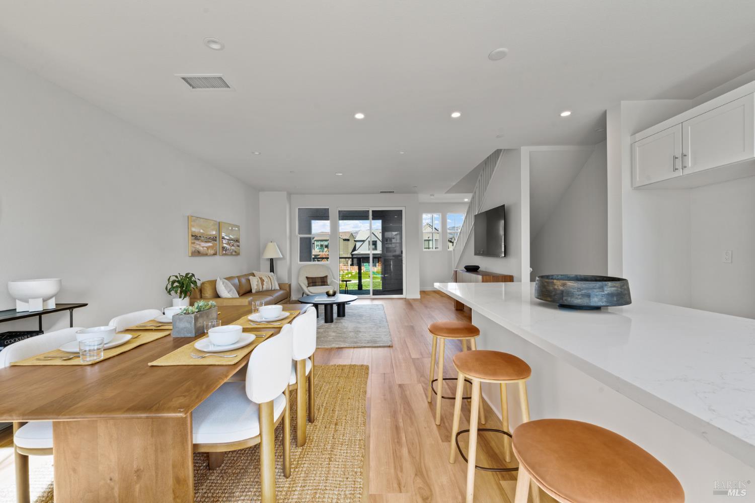 1460 Waterside Lane Rohnert Park, CA 94928 - Photo 3 of 21 a view of a dining room with furniture and wooden floor
