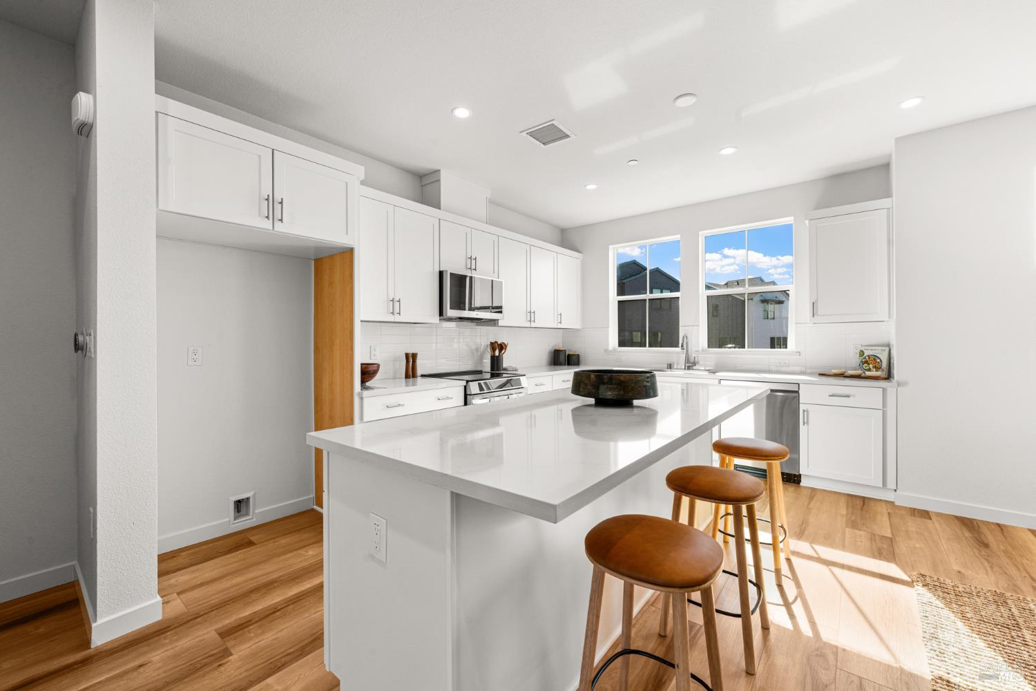1460 Waterside Lane Rohnert Park, CA 94928 - Photo 6 of 21 a kitchen with stainless steel appliances granite countertop a sink and a refrigerator