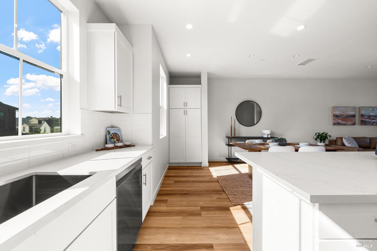 1460 Waterside Lane Rohnert Park, CA 94928 - Photo 7 of 21 a kitchen with a stove a sink and a refrigerator