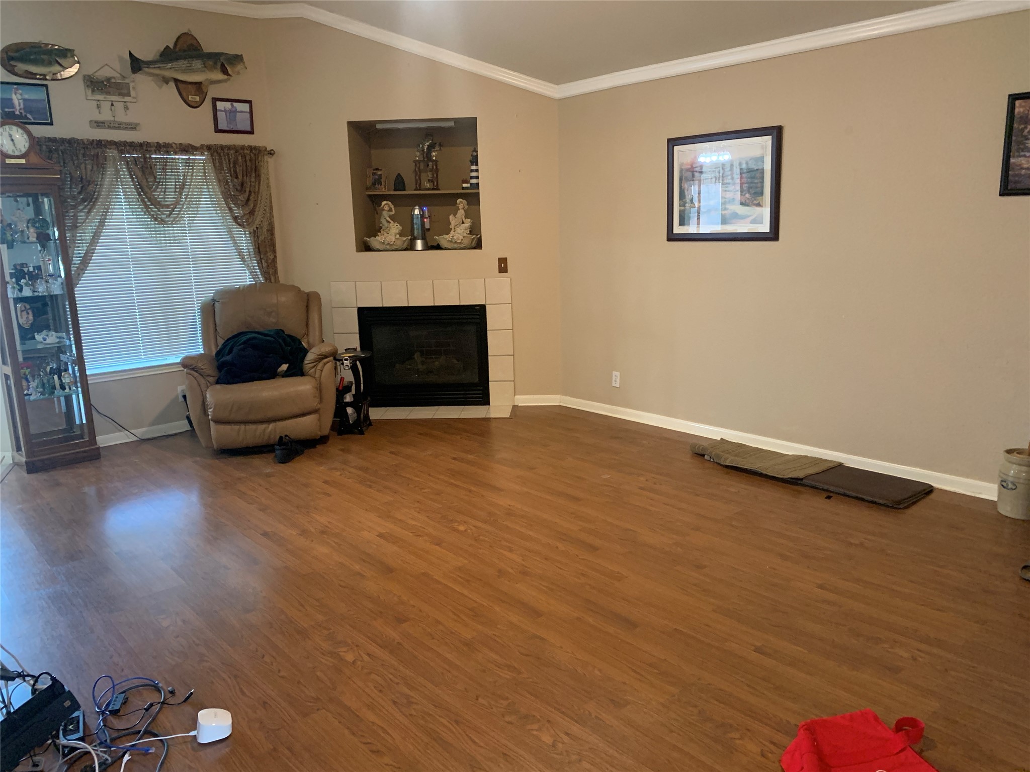 150 Elmer Cove Kyle, TX 78640 - Photo 5 of 11 a living room with furniture and a fireplace