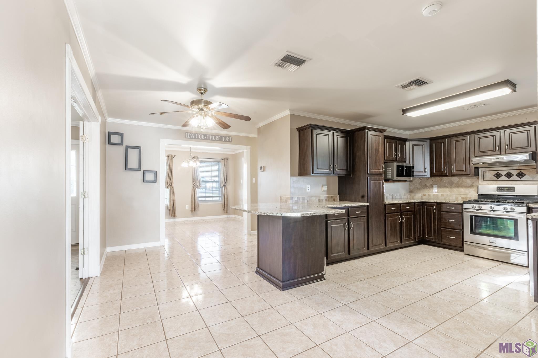 245 Acadia Drive Raceland, LA 70394 - Photo 15 of 30 kitchen to dining