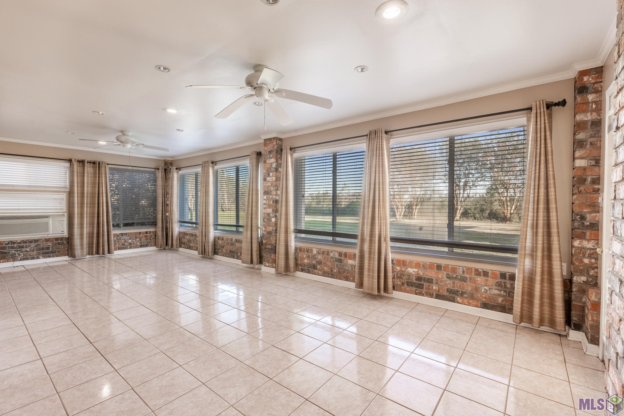245 Acadia Drive Raceland, LA 70394 - Photo 16 of 30 sun room