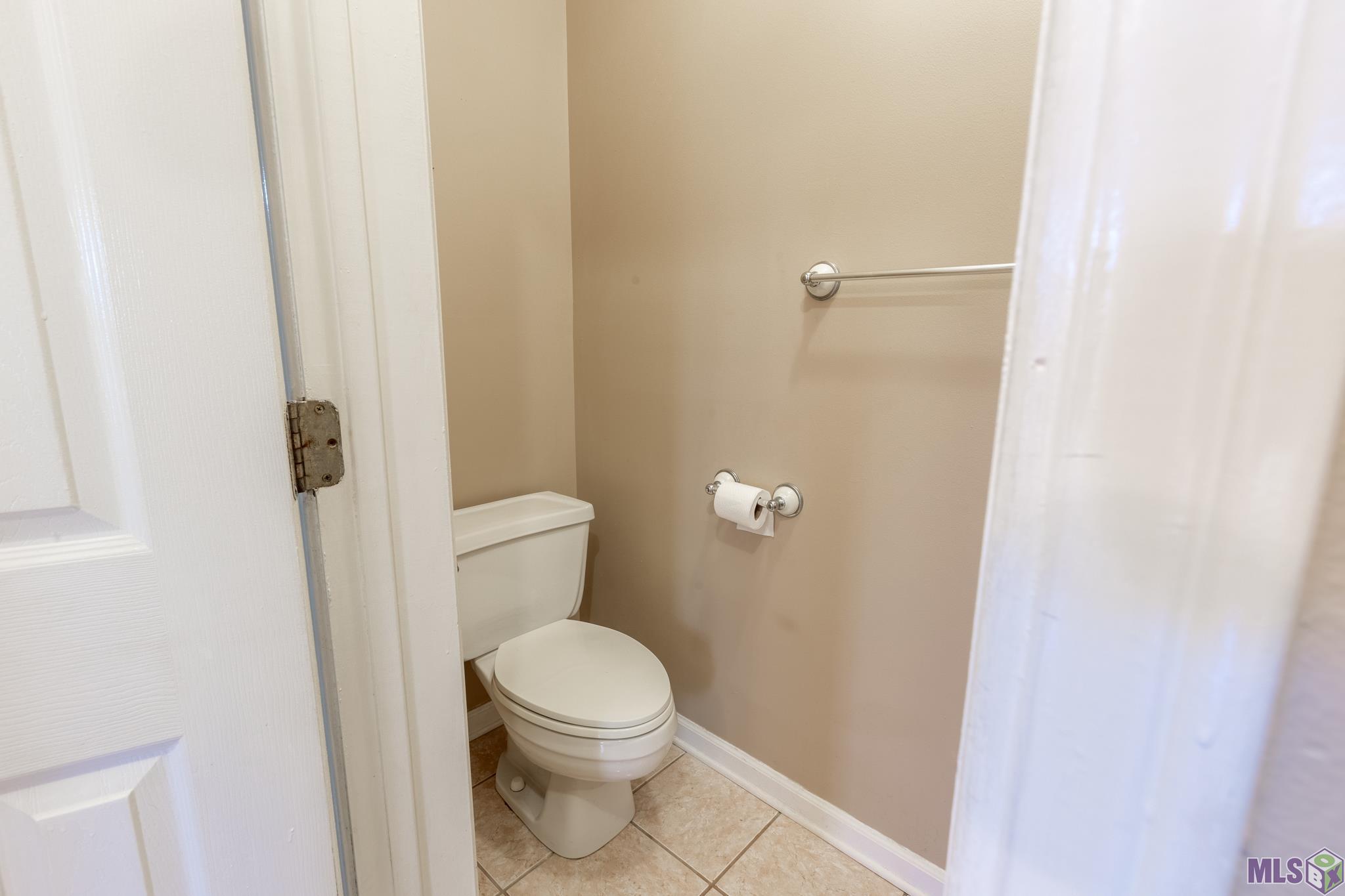 245 Acadia Drive Raceland, LA 70394 - Photo 22 of 30 half bath downstairs