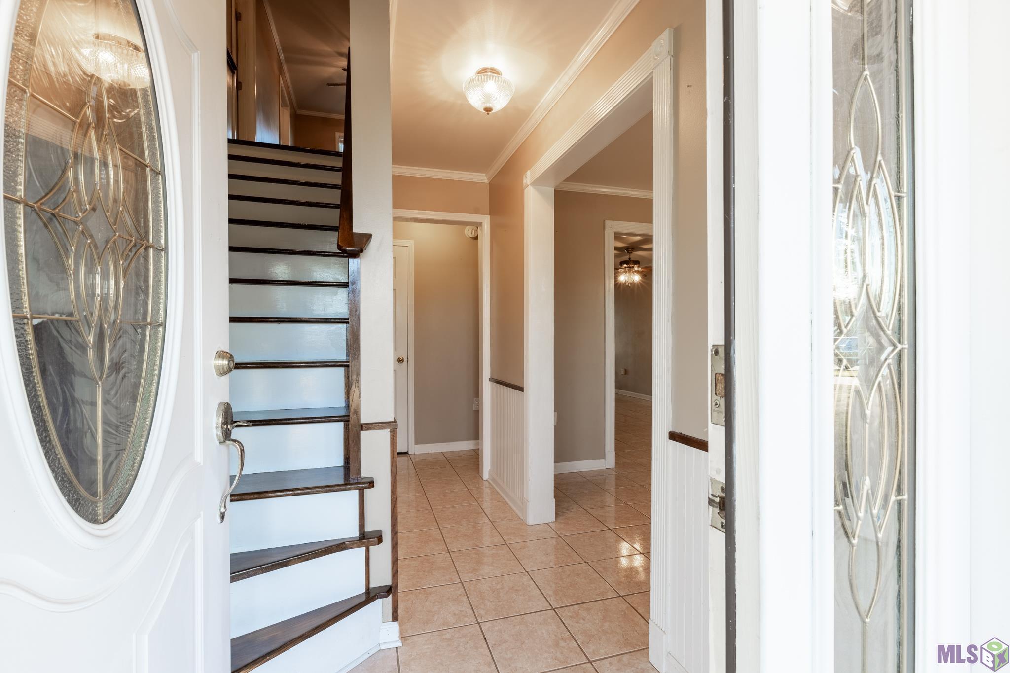 245 Acadia Drive Raceland, LA 70394 - Photo 23 of 30 staircase from front door