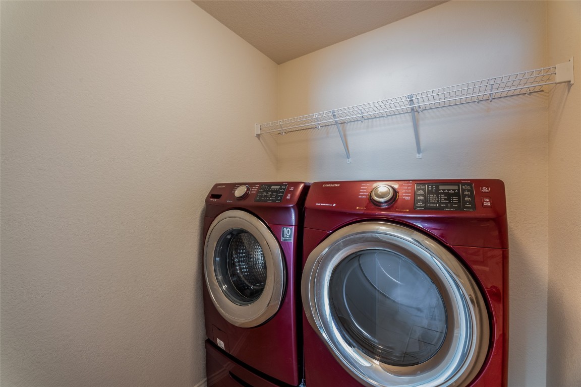 200 Falcon Lane Leander, TX 78641 - Photo 10 of 20 Laundry room featuring separate washer and dryer