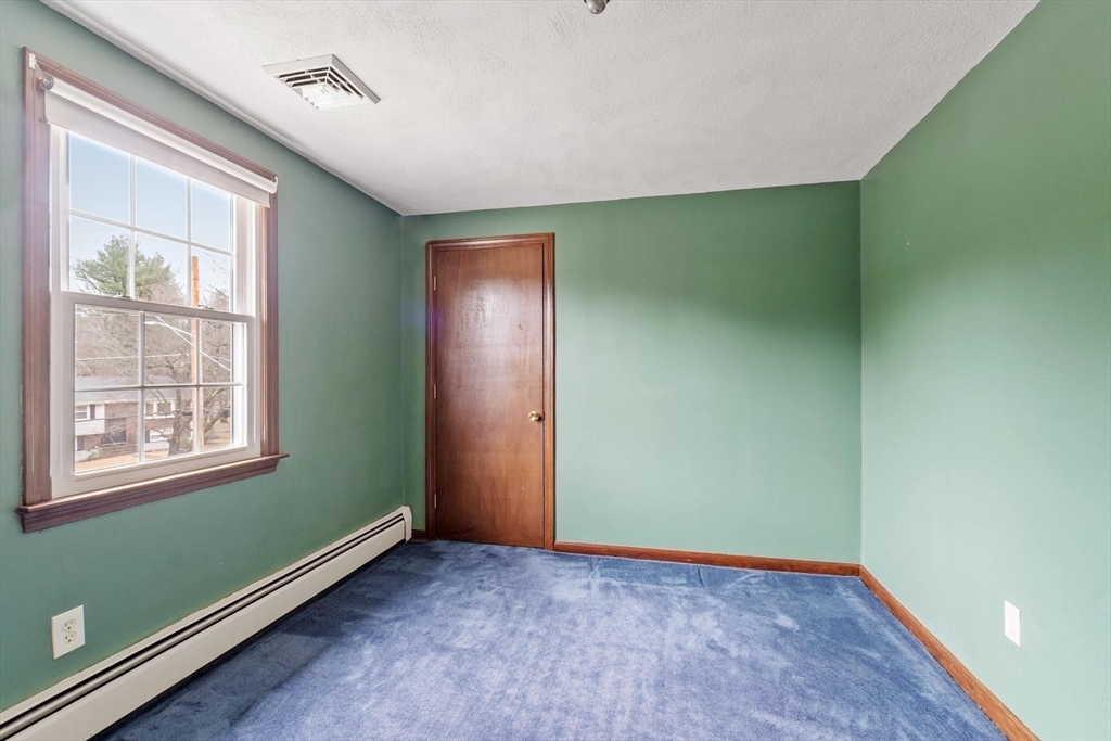 61 Beaver Road Reading, MA 01867 - Photo 28 of 39 an empty room with windows