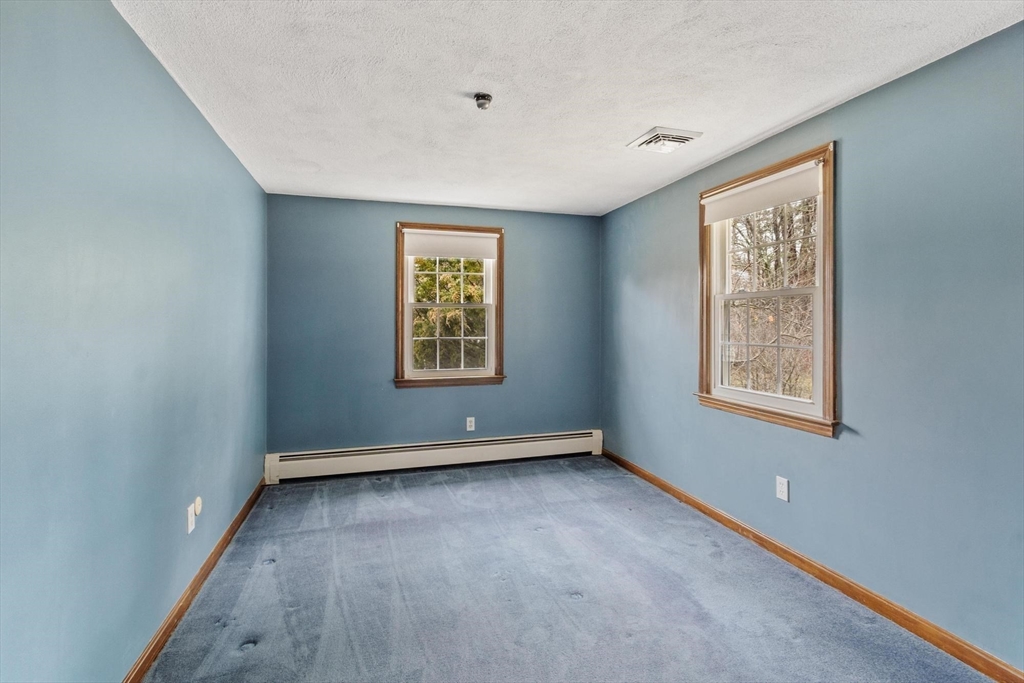 61 Beaver Road Reading, MA 01867 - Photo 30 of 39 an empty room with windows