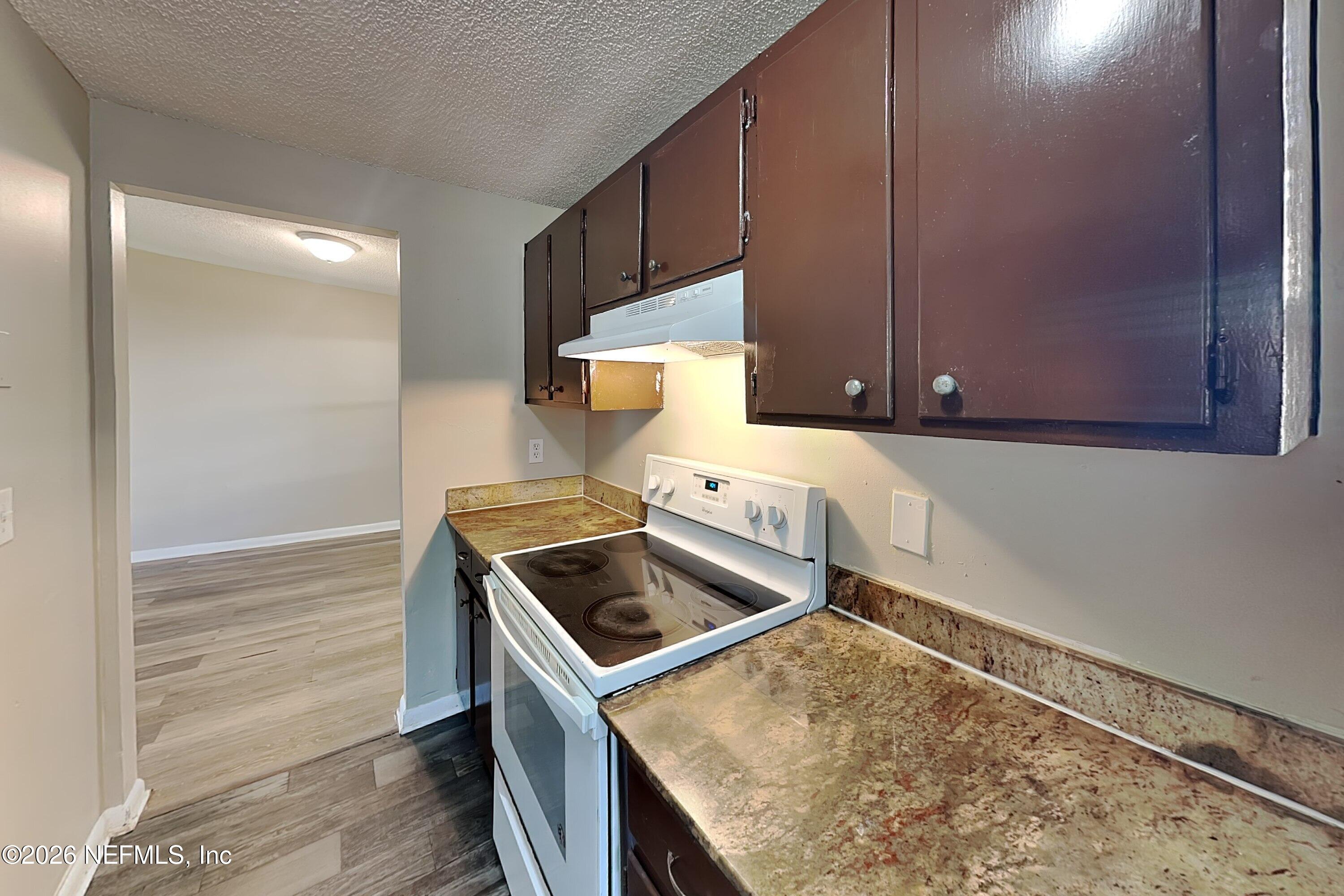 4888 Strato Road West Jacksonville, FL 32210 - Photo 6 of 19 5_Kitchen-01_pc_4dD2HRUjxH_bN9JzbASzp_la