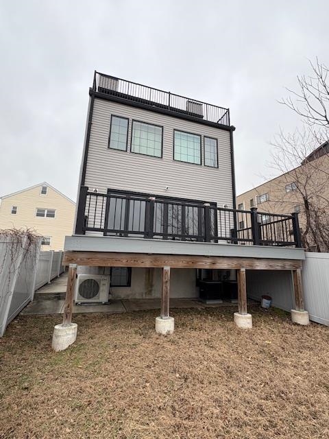 107 Mountain Road Jersey City, NJ 07307 - Photo 39 of 41 a view of a house with a wooden deck