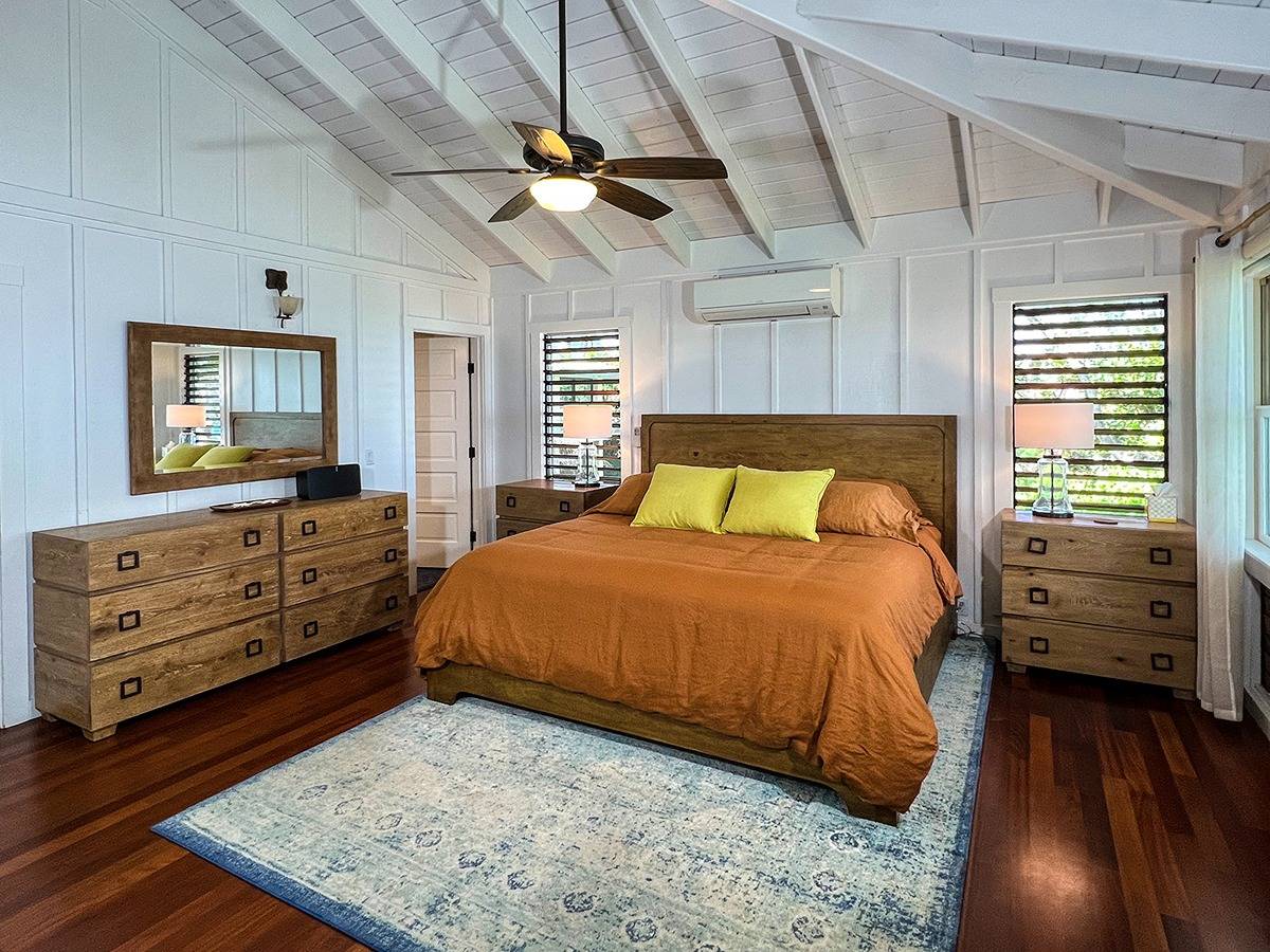 7324 Alealea Road Hanalei, HI 96714 - Photo 11 of 30 a bedroom with a bed and a dresser