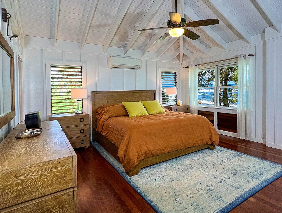 7324 Alealea Road Hanalei, HI 96714 - Photo 12 of 30 a bedroom with a bed and window