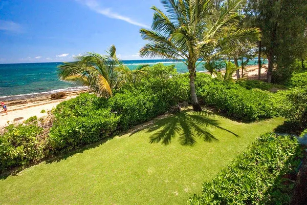 a view of swimming pool with a yard