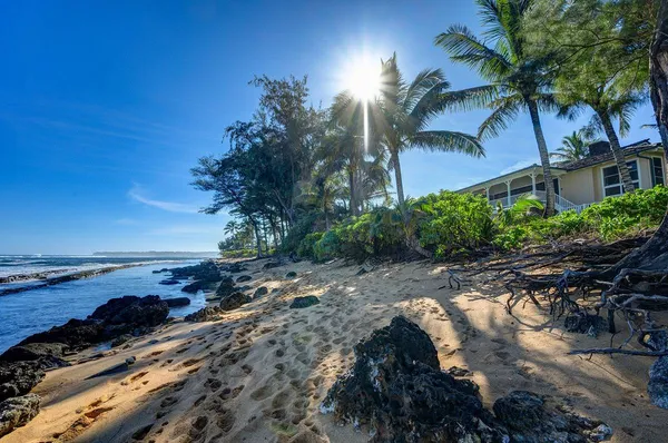a couple of of water next to a building