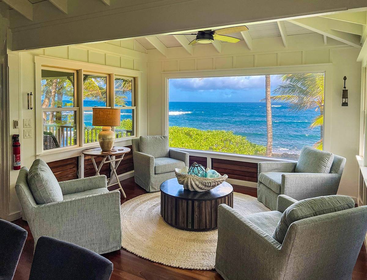 7324 Alealea Road Hanalei, HI 96714 - Photo 7 of 30 a living room with furniture and a large window