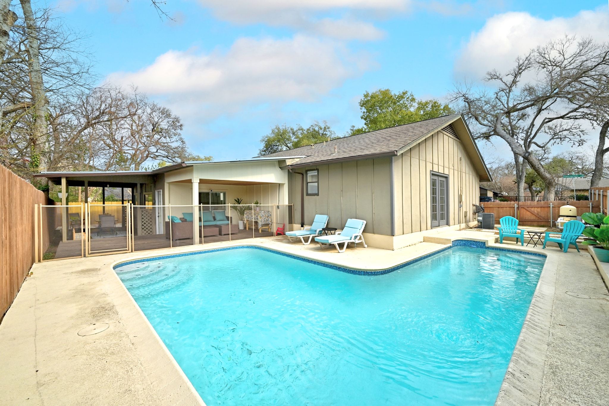 7210 Towering Oaks Drive Austin, TX 78745 - Photo 2 of 38 a view of a house with swimming pool having patio