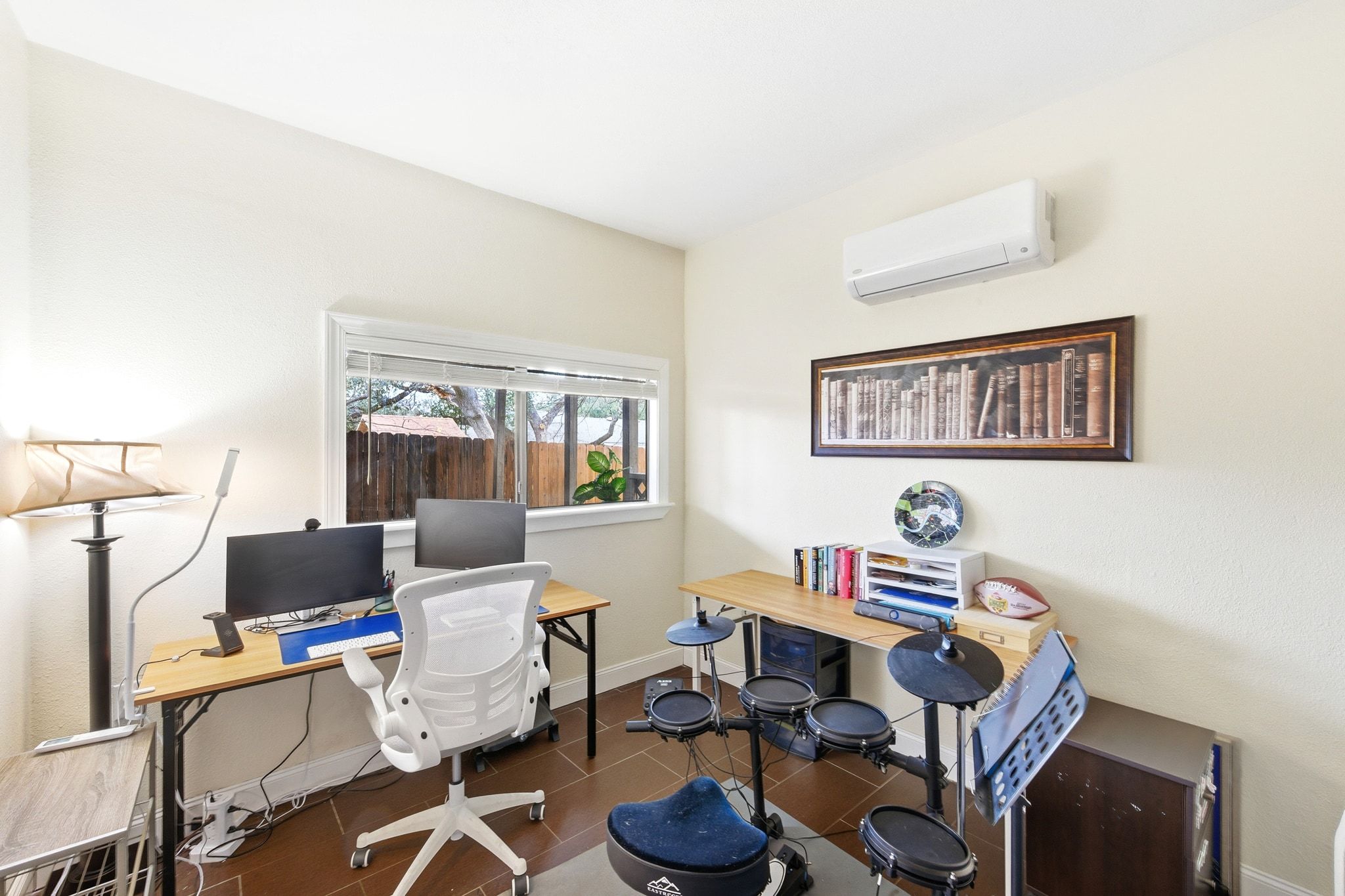 7210 Towering Oaks Drive Austin, TX 78745 - Photo 22 of 38 One of the secondary bedrooms is situated on the lower level off the sun room and comes with a mini split.