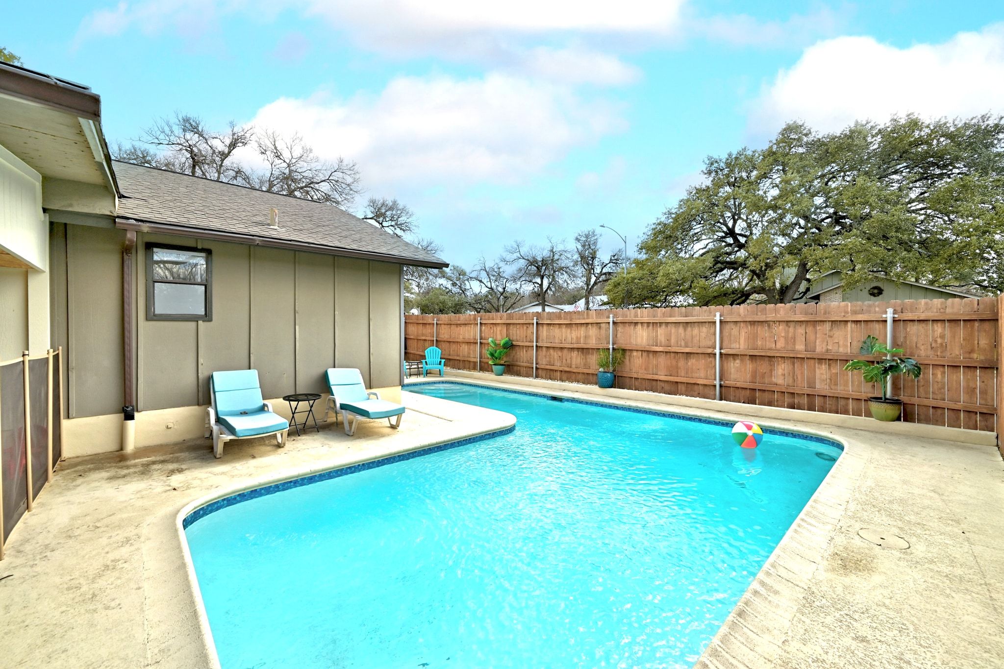 7210 Towering Oaks Drive Austin, TX 78745 - Photo 32 of 38 The wrap around pool is your private oasis for refreshing summer fun and is fully enclosed with pool safety fencing.