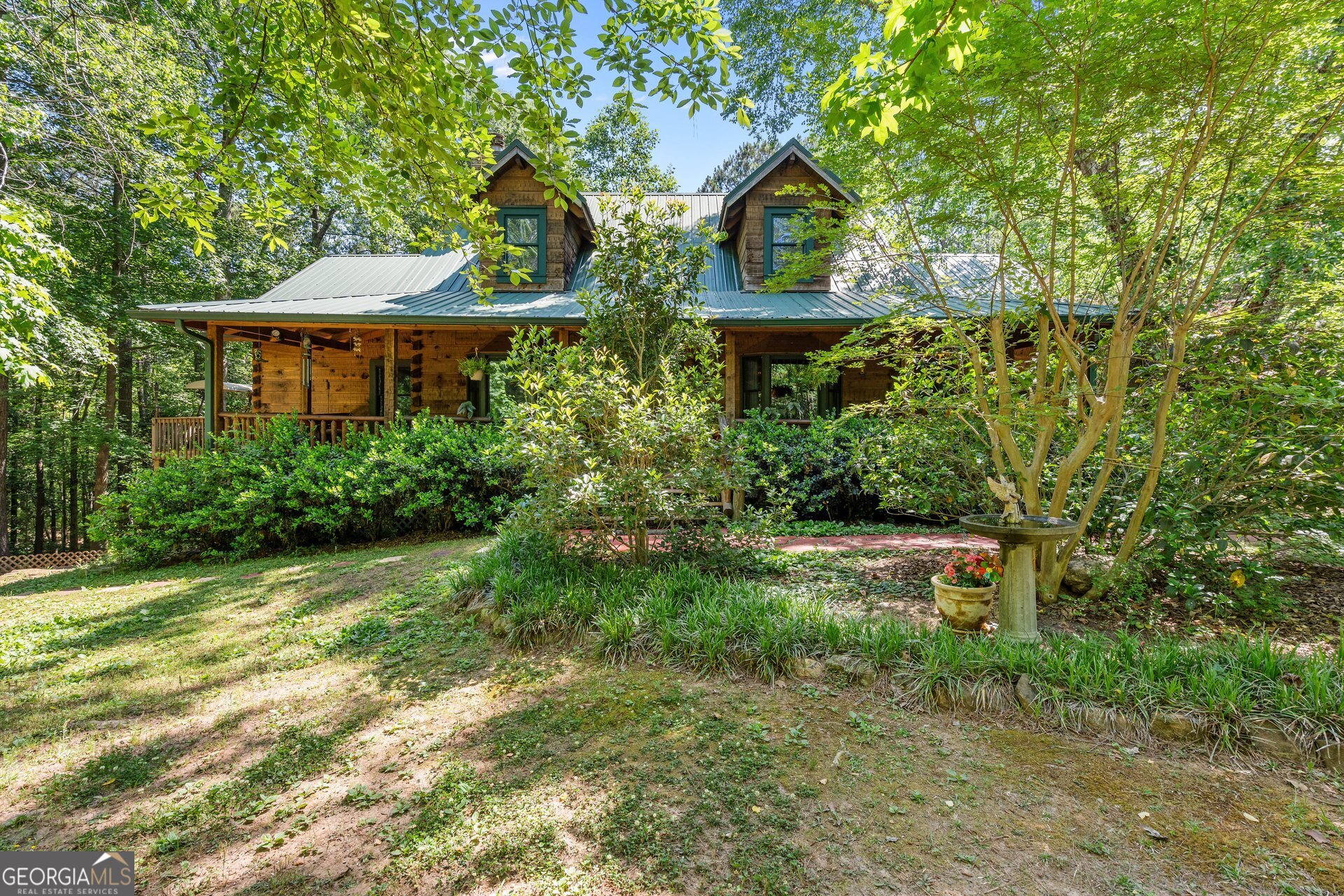 4930 Post Road Winston, GA 30187 - Photo 4 of 59 a front view of a house with a yard and trees