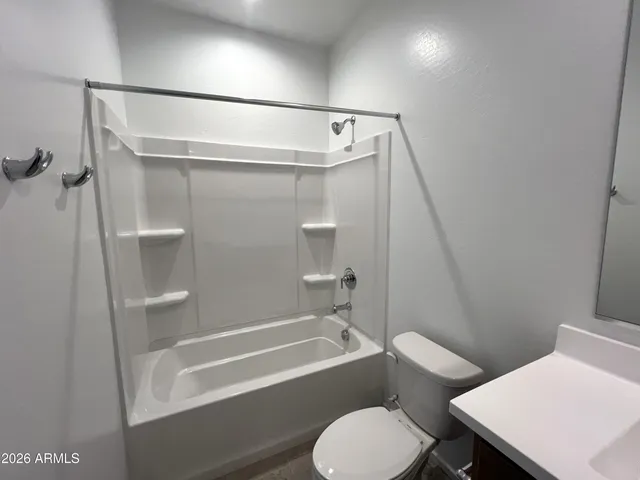 a bathroom with a sink and a toilet