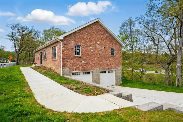 front view of house with a yard
