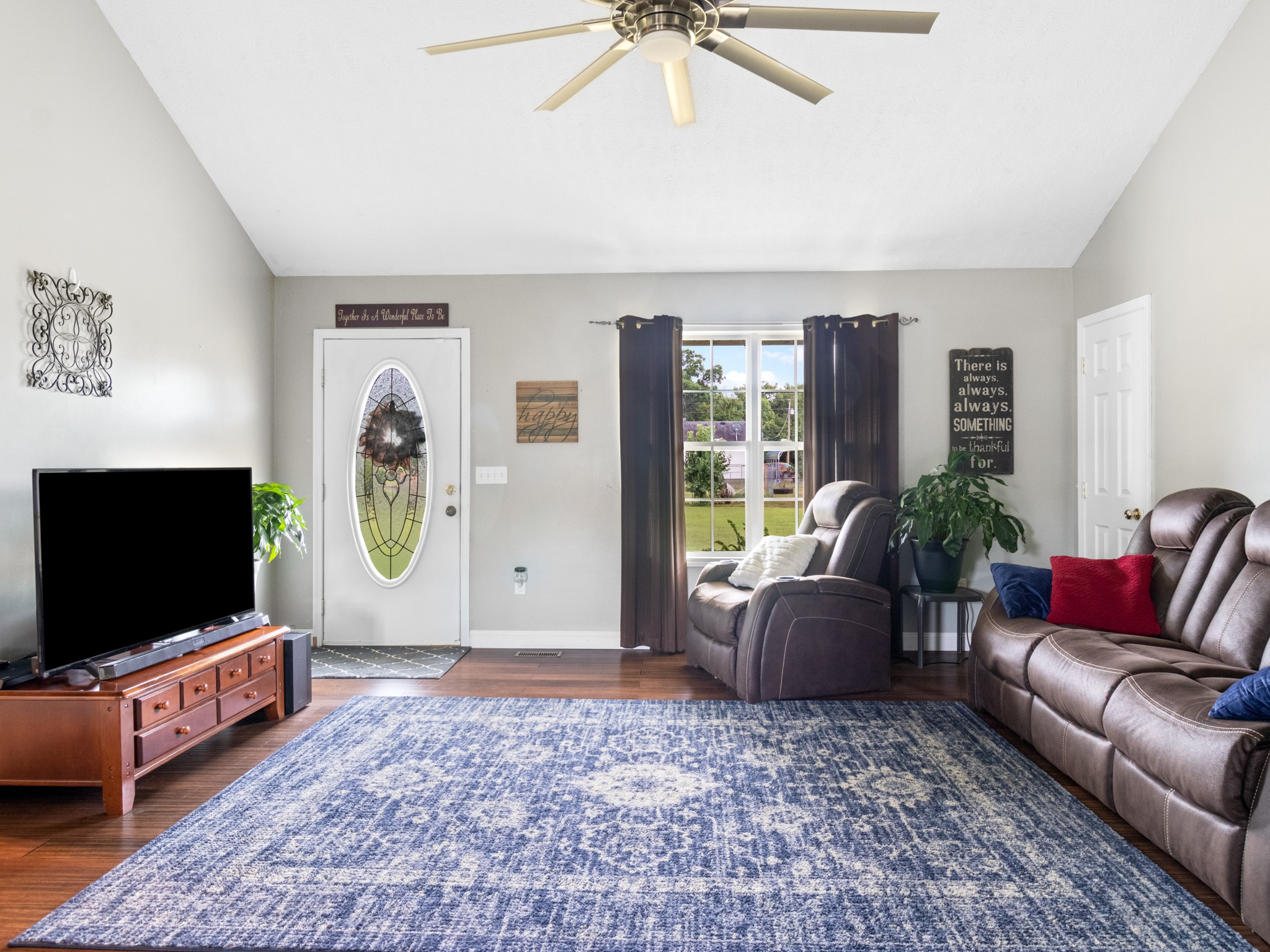 141 Sudberry Road Bell Buckle, TN 37020 - Photo 9 of 33 a living room with furniture and a flat screen tv