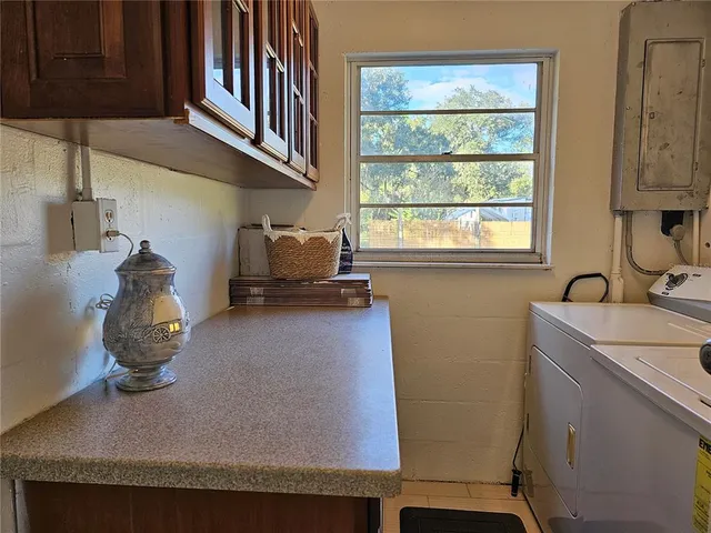 a view of a swimming pool with an outdoor space and seating area