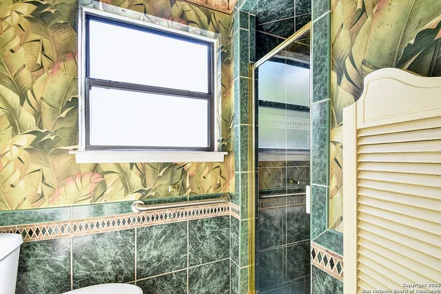 a bathroom with a window